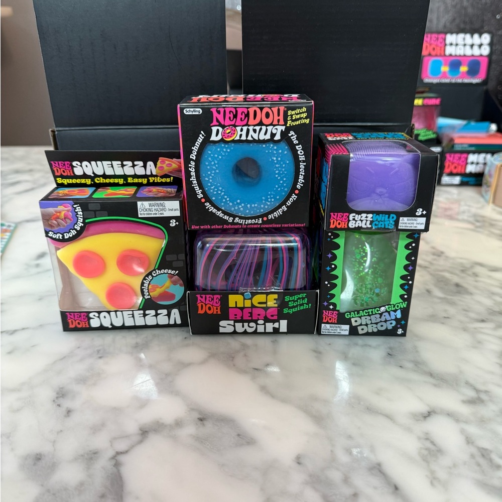 Nee Doh squishy bundle pizza swirl donut drop cat